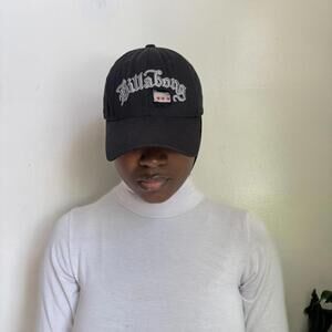 Vintage Black Billabong cap with embroidered logo